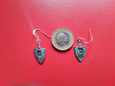 Wolf inset in arrow earrings 1